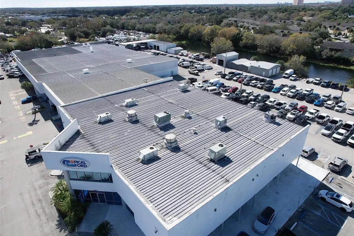 Aerial view of the metal roof on Tropical Ford, a Florida car dealership
