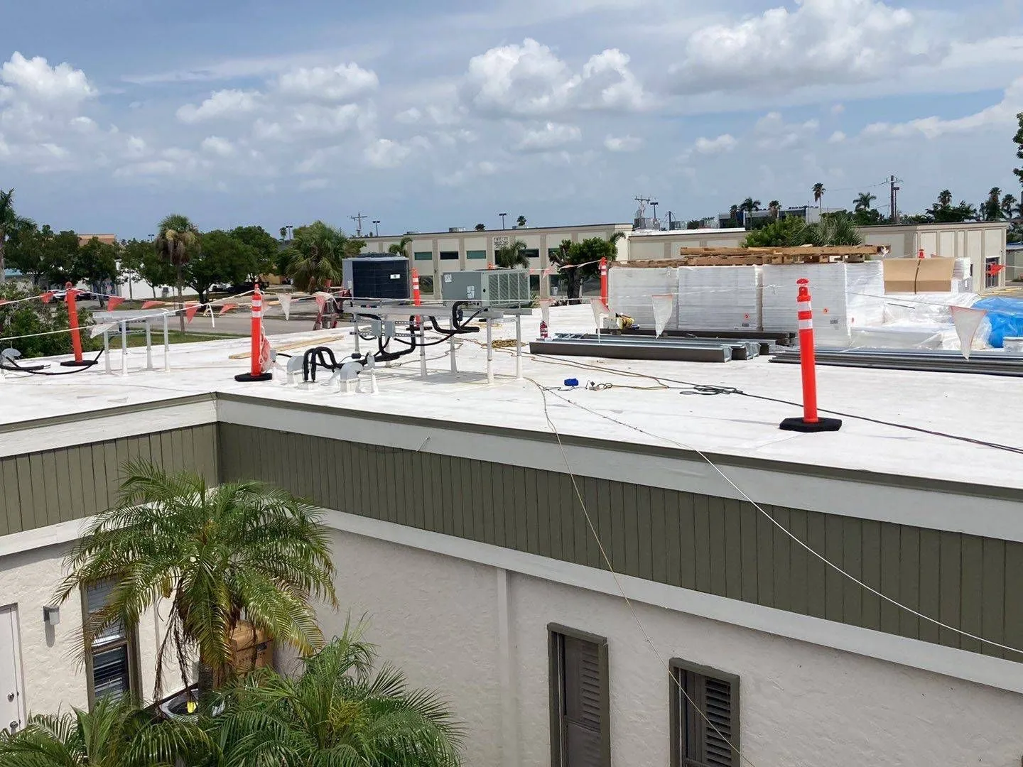 Royalty crew performing a commercial roof leak repair